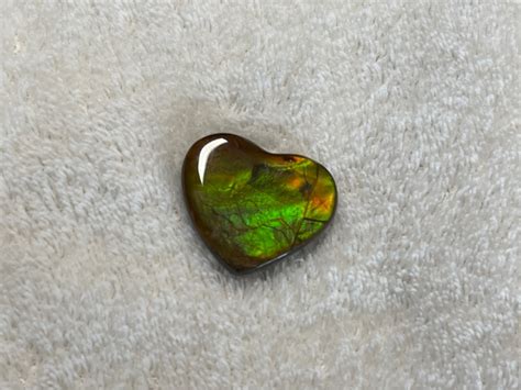 班彩缧|斑彩石(Ammolite)產品及功效介紹